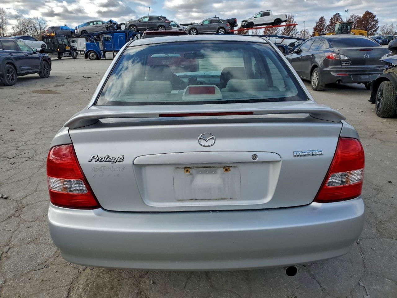 2003 Mazda Protege Dx VIN: JM1BJ226130111731 Lot: 94324375