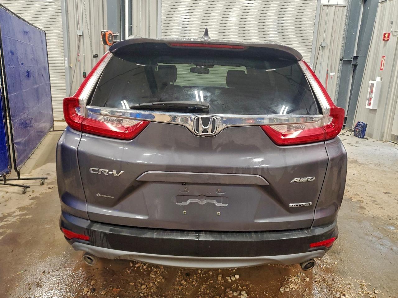 2017 Honda Cr-V Touring VIN: 2HKRW2H94HH681590 Lot: 94311195