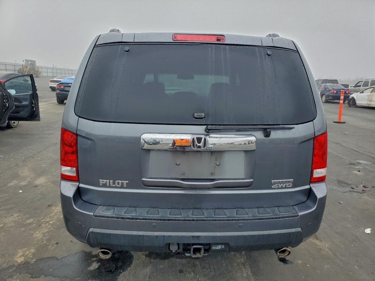 2011 Honda Pilot Touring VIN: 5FNYF4H95BB102510 Lot: 93776725