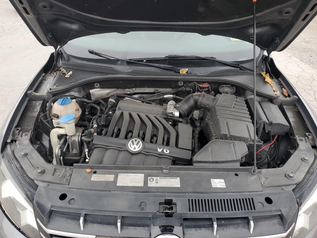 2013 Volkswagen Passat Sel VIN: 1VWCM7A32DC010887 Lot: 92842785