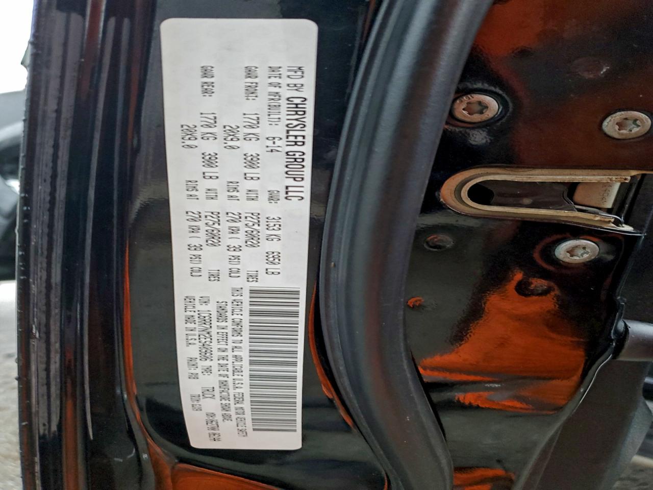 2014 Ram 1500 Laramie VIN: 1C6RR7NM2ES409606 Lot: 93352475