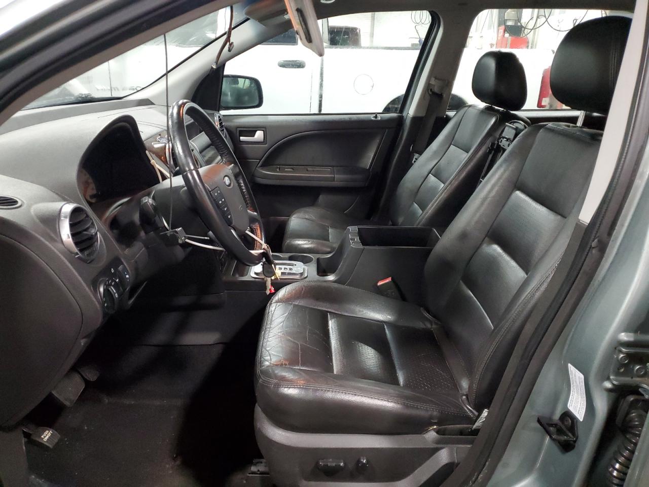 2005 Ford Freestyle Limited VIN: 1FMDK06165GA71323 Lot: 93416985