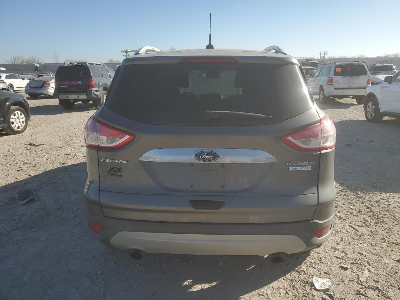 2014 Ford Escape Titanium VIN: 1FMCU0JXXEUC21582 Lot: 93422375