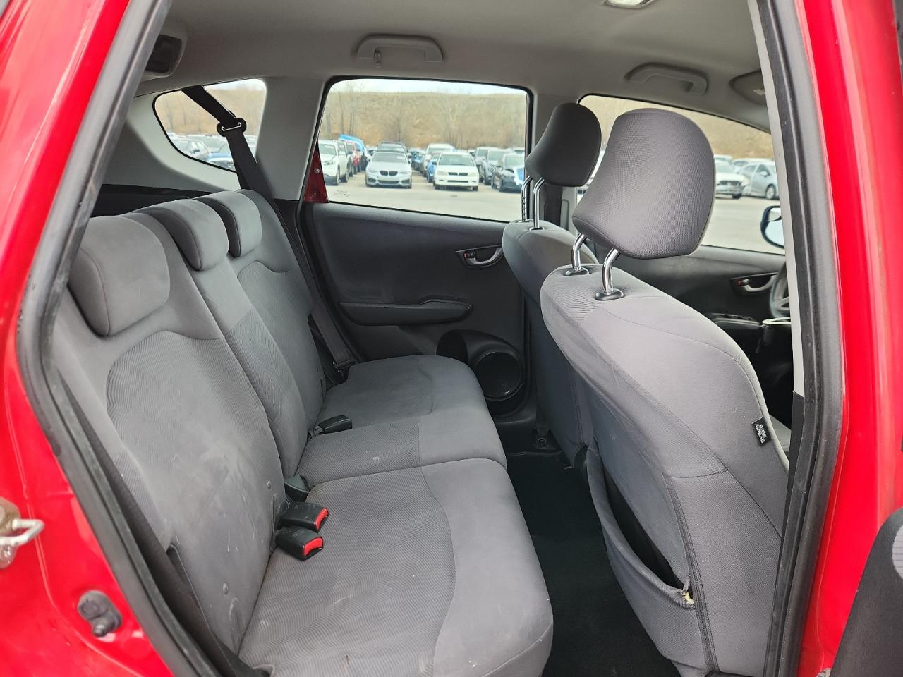 2009 Honda Fit VIN: JHMGE88269S016353 Lot: 92920135