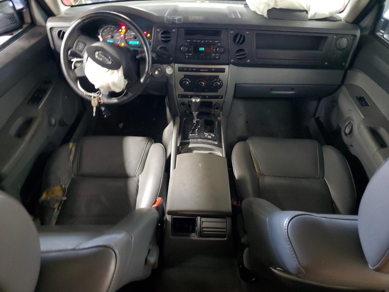 2007 Jeep Commander VIN: 1J8HG48P47C584461 Lot: 92449625