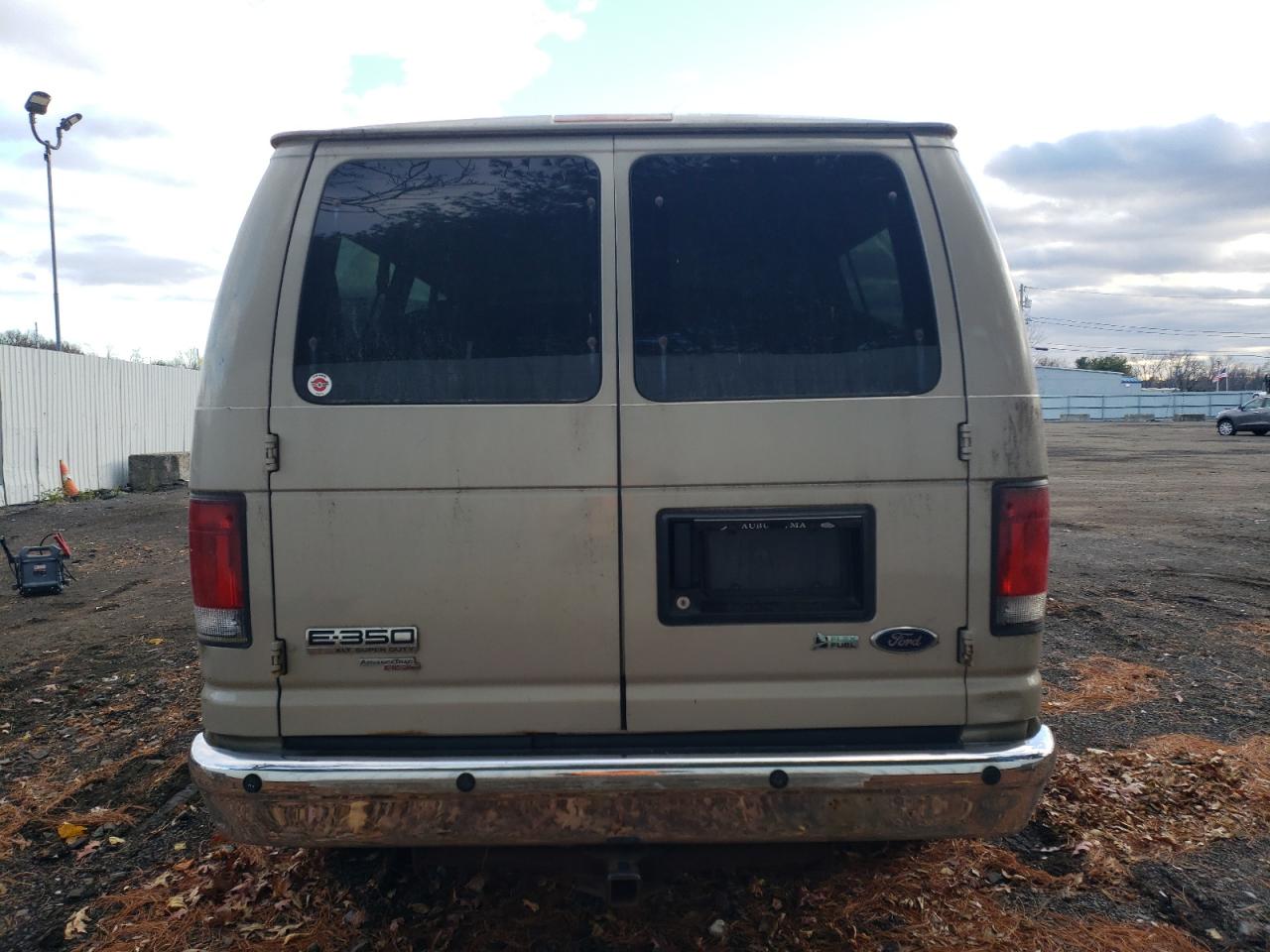 2011 Ford Econoline E350 Super Duty Wagon VIN: 1FBNE3BL9BDA31974 Lot: 93261945