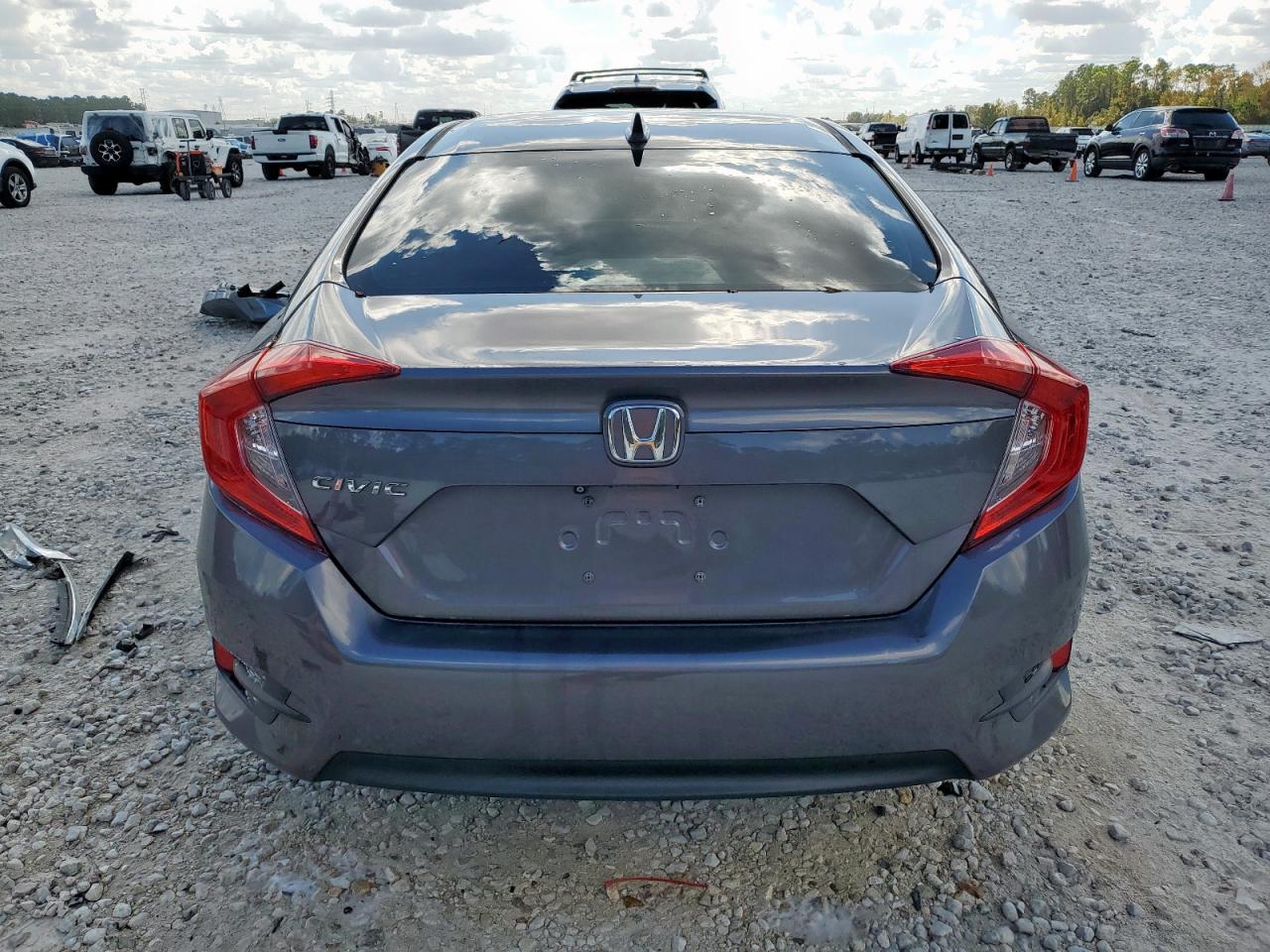 2018 Honda Civic Ex VIN: 19XFC2F77JE013497 Lot: 92830345