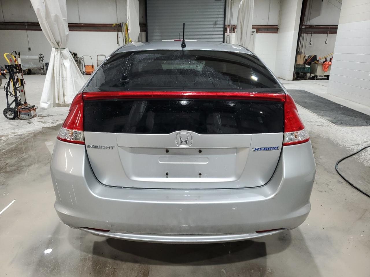 2010 Honda Insight Ex VIN: JHMZE2H79AS002145 Lot: 92627145