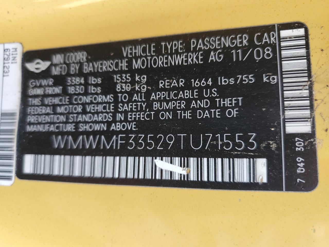 2009 Mini Cooper VIN: WMWMF33529TU71553 Lot: 92333375