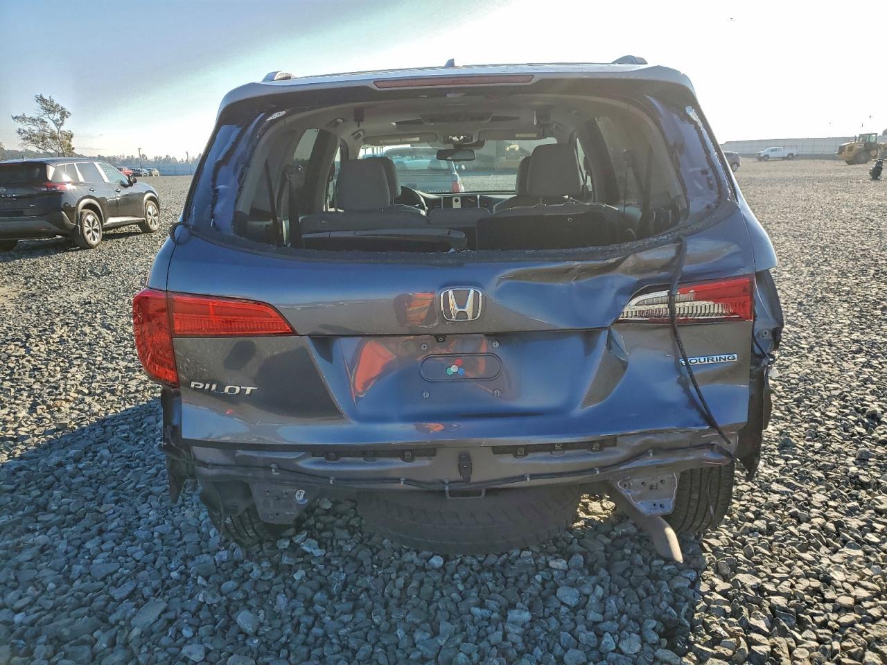 2018 Honda Pilot Touring VIN: 5FNYF5H98JB009193 Lot: 94774375