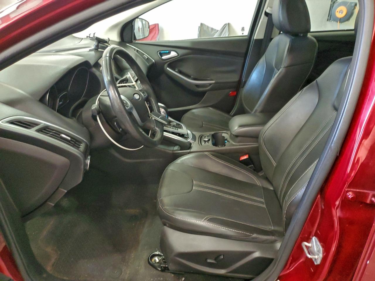 2014 Ford Focus Titanium VIN: 1FADP3J21EL104555 Lot: 94119355