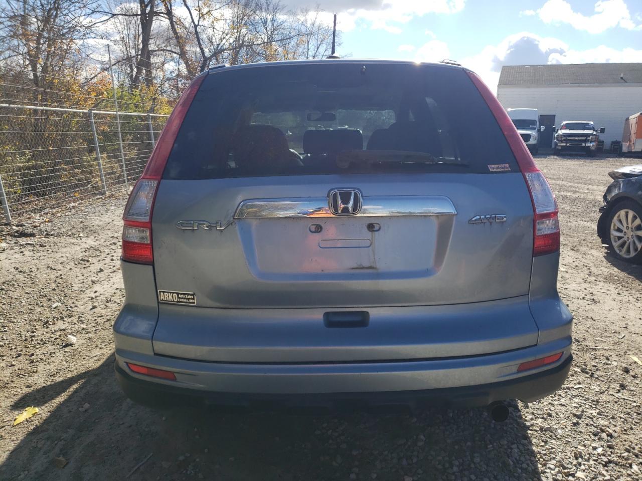 2010 Honda Cr-V Exl VIN: JHLRE4H78AC006021 Lot: 91360255