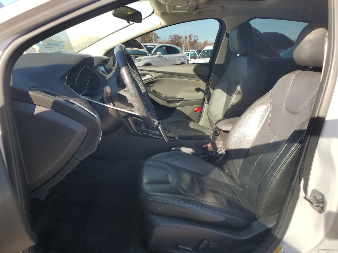 2015 Ford Focus Titanium VIN: 1FADP3J23FL383637 Lot: 91919455