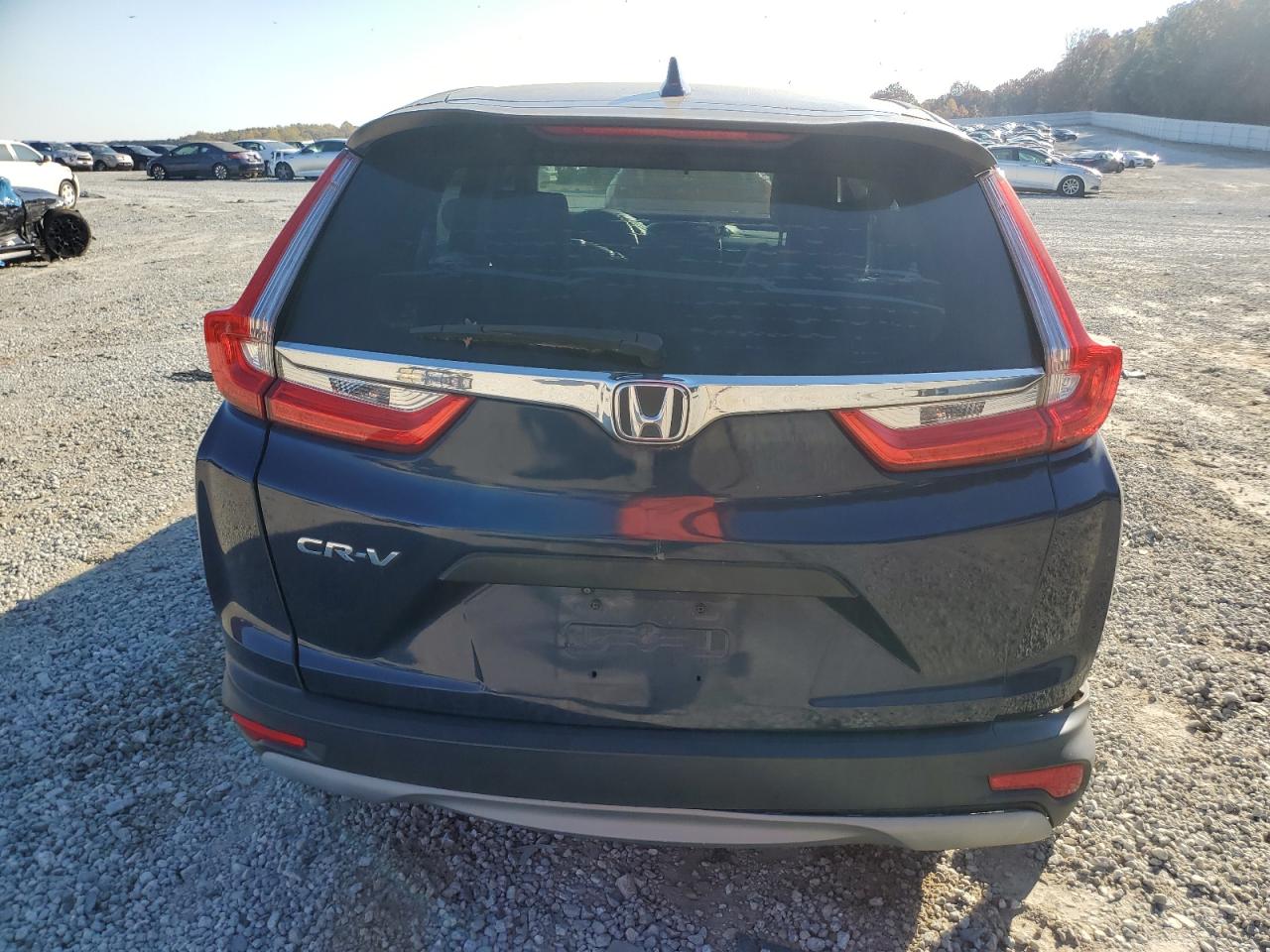 2019 Honda Cr-V Lx VIN: 2HKRW5H33KH409911 Lot: 91259125