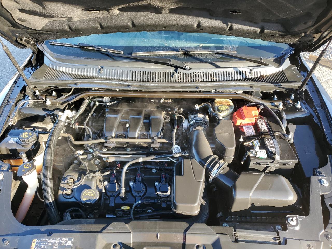 2016 Ford Taurus Sel VIN: 1FAHP2E81GG121748 Lot: 91039055