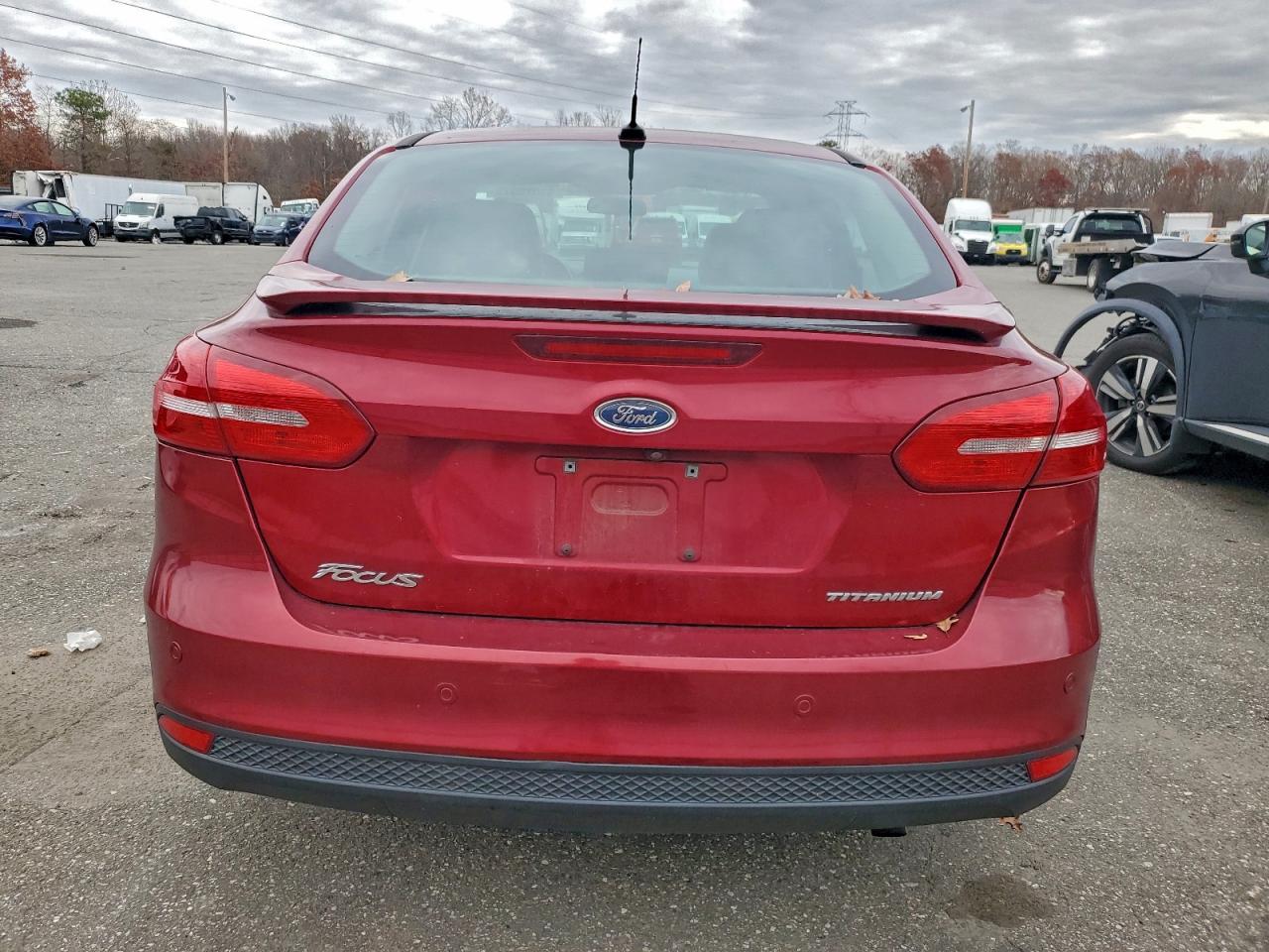 2016 Ford Focus Titanium VIN: 1FADP3J20GL256605 Lot: 93925575