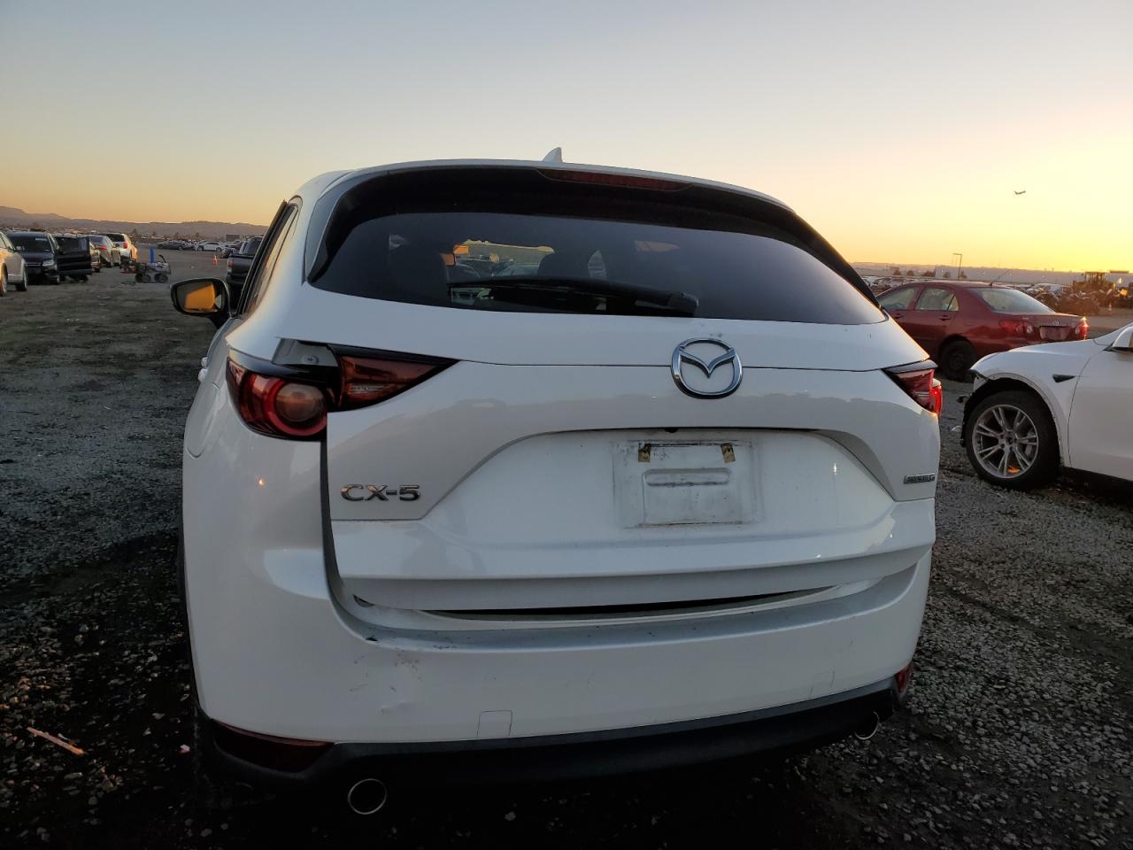 2021 Mazda Cx-5 Touring VIN: JM3KFACM2M0412817 Lot: 93701275