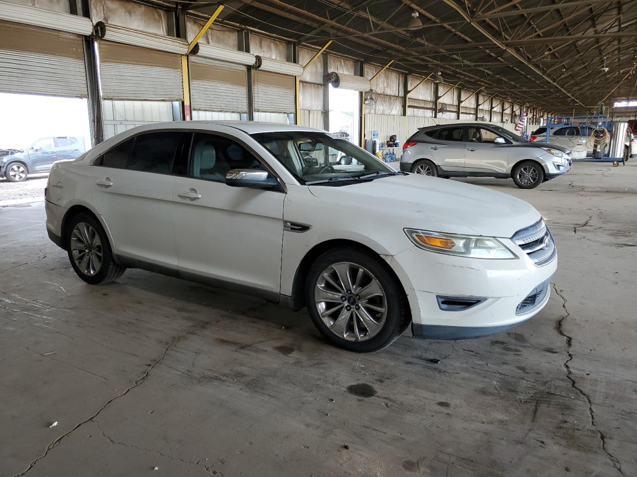 2010 Ford Taurus Limited VIN: 1FAHP2FW9AG133831 Lot: 93275025