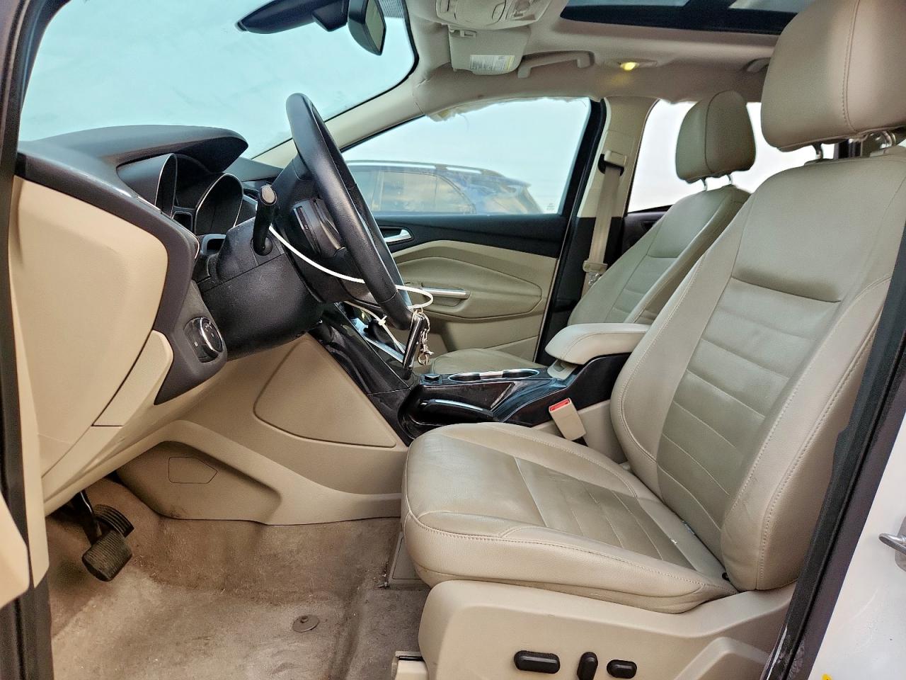 2014 Ford Escape Titanium VIN: 1FMCU0J94EUB71554 Lot: 92936585