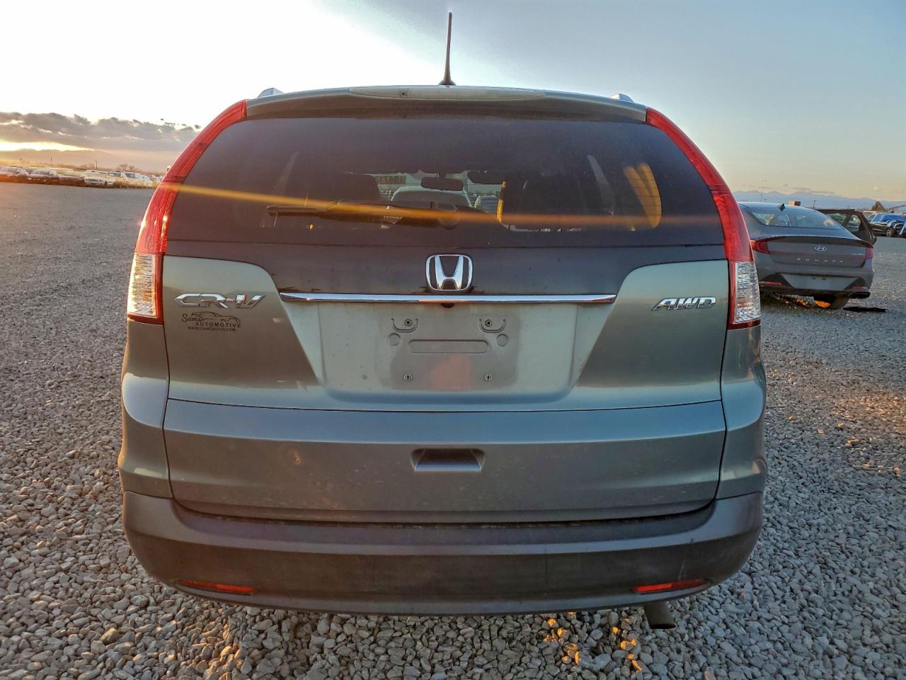 2012 Honda Cr-V Exl VIN: JHLRM4H73CC026733 Lot: 94713125