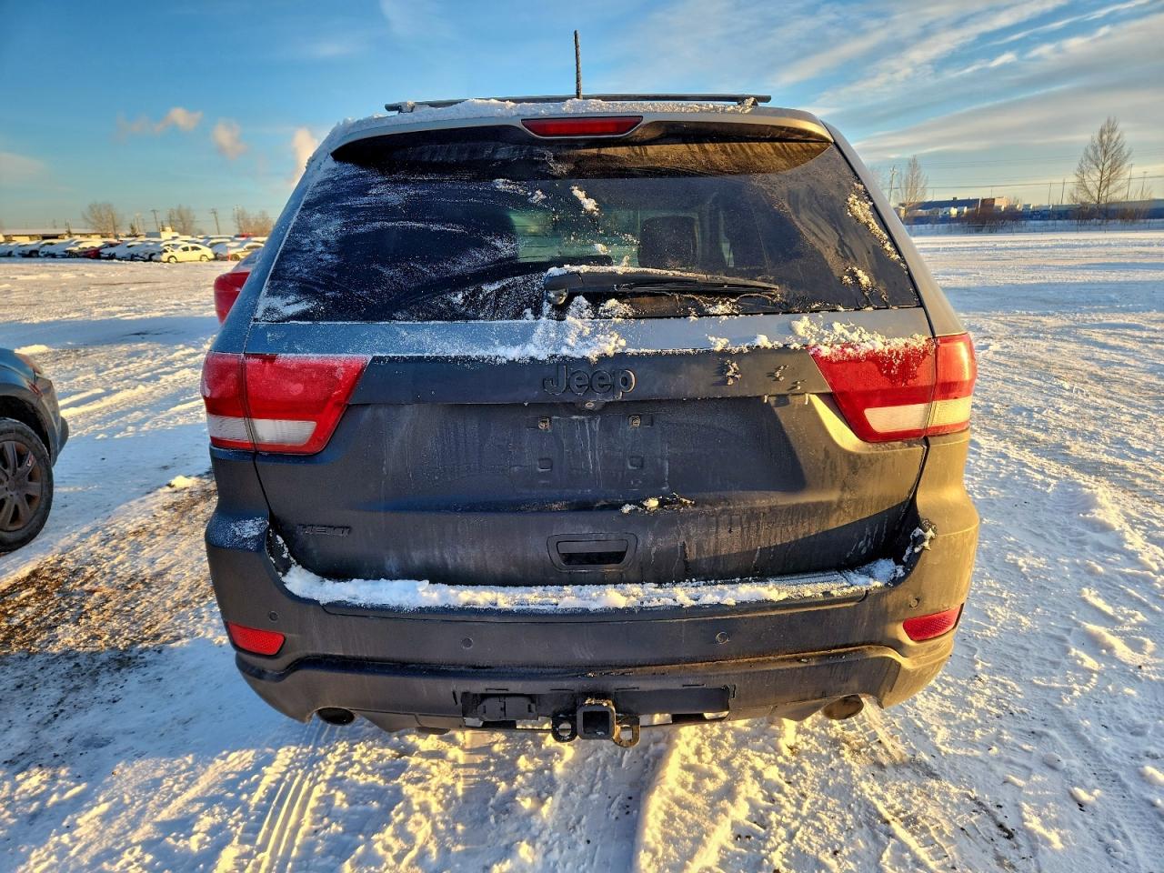 2012 Jeep Grand Cherokee Laredo VIN: 1C4RJFAT0CC104717 Lot: 94395205