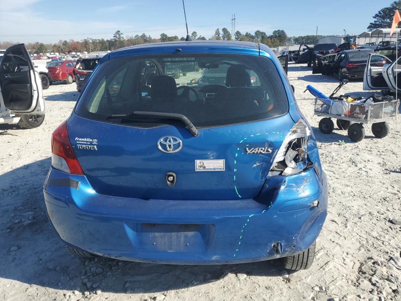 2009 Toyota Yaris VIN: JTDJT903195229409 Lot: 93008505