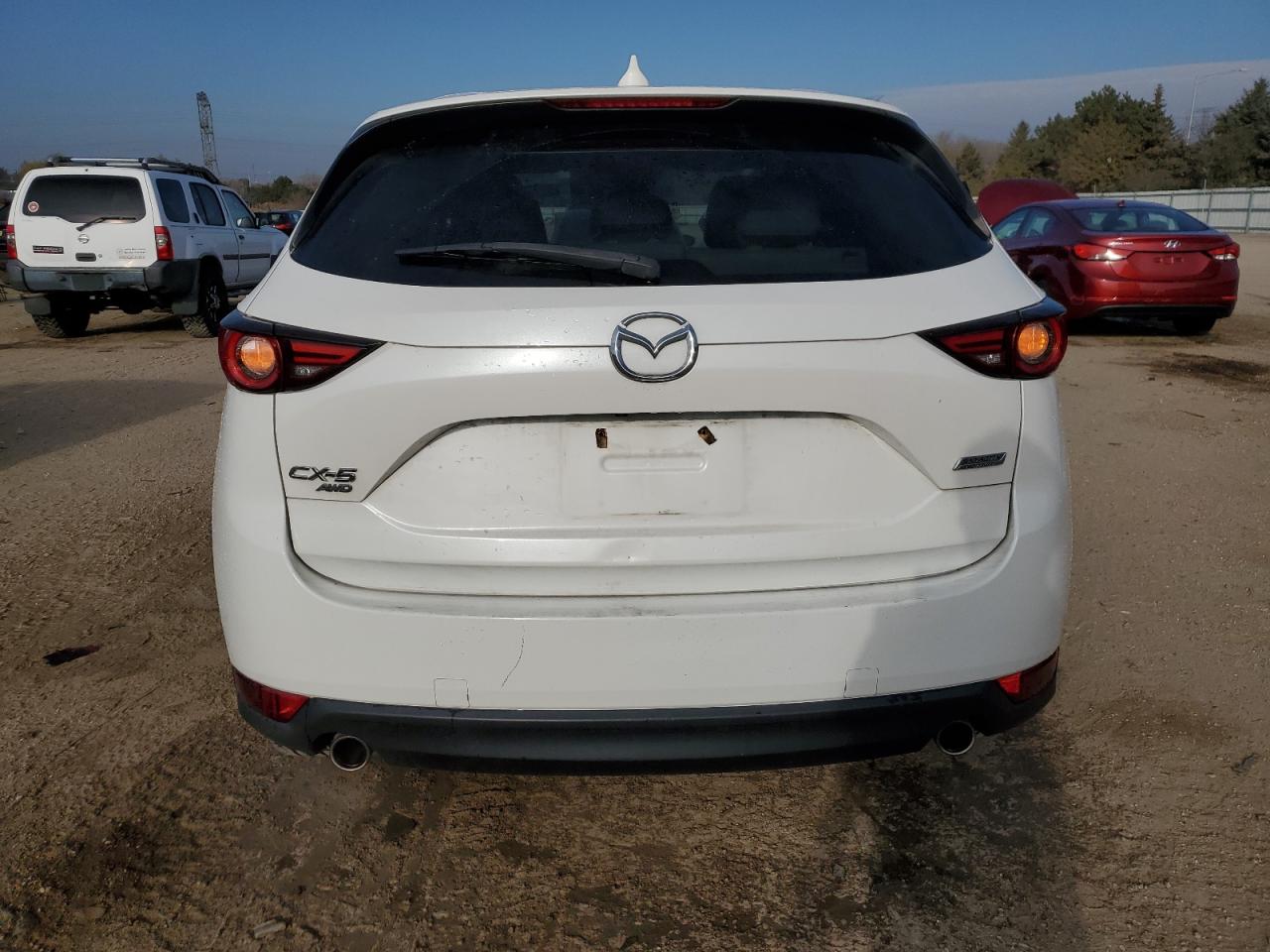2019 Mazda Cx-5 Grand Touring VIN: JM3KFBDMXK0612636 Lot: 91250175