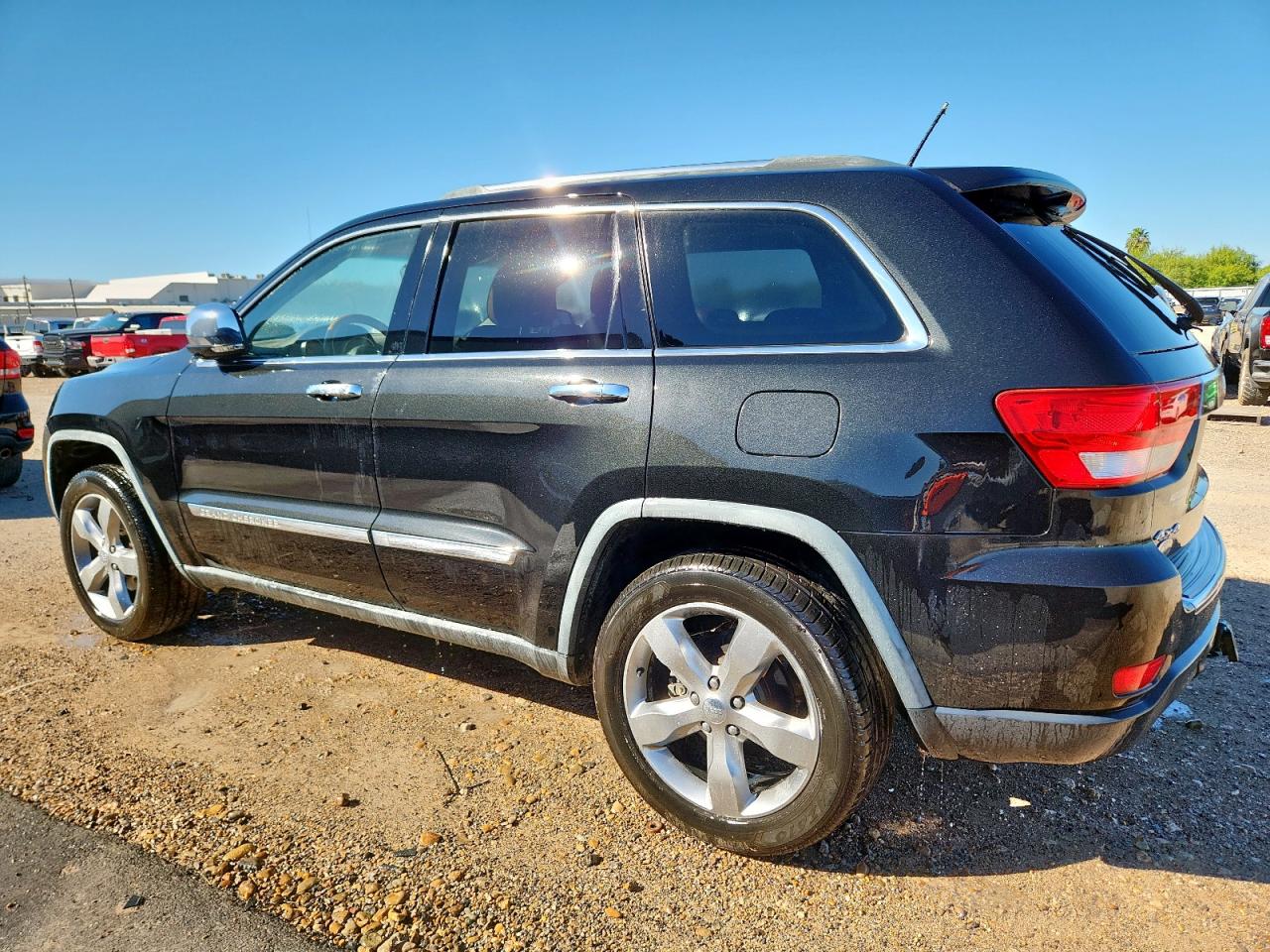 2011 Jeep Grand Cherokee Overland black suv flexible 1J4RR6GG0BC641776 photo #3