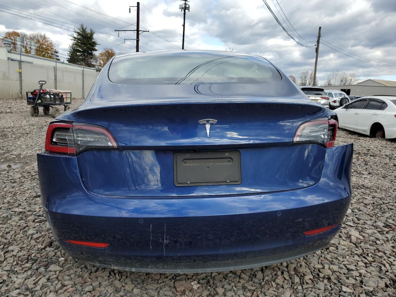 2020 Tesla Model 3 VIN: 5YJ3E1EA9LF797702 Lot: 92700985
