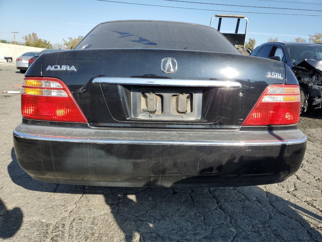 2000 Acura 3.5Rl VIN: JH4KA9662YC011810 Lot: 91226165