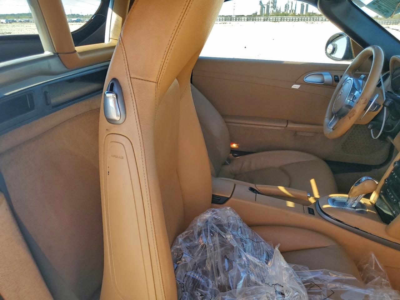 2012 Porsche Boxster VIN: WP0CA2A83CS710349 Lot: 94140075