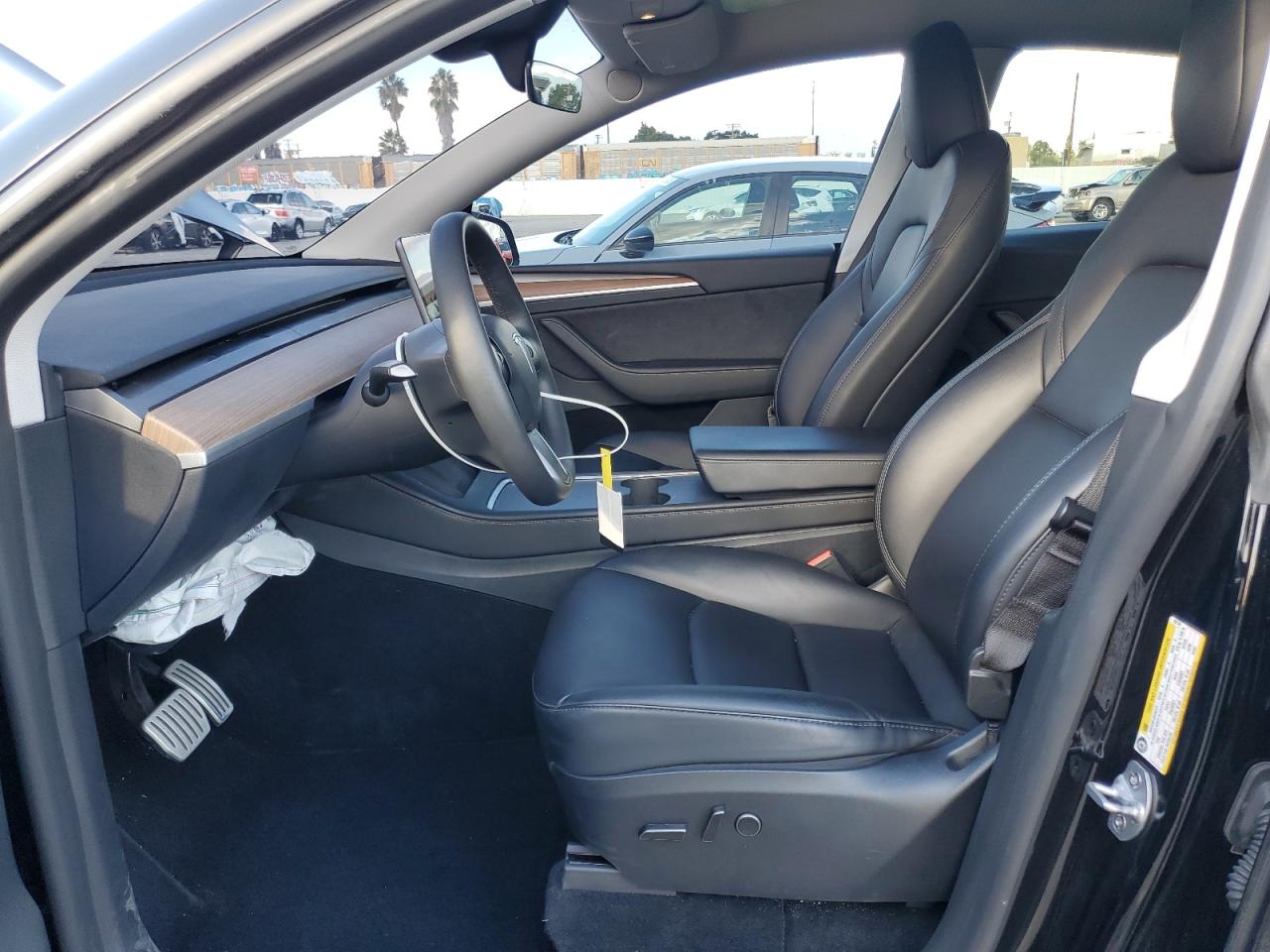 2023 Tesla Model Y VIN: 7SAYGDEFXPF897149 Lot: 92840375