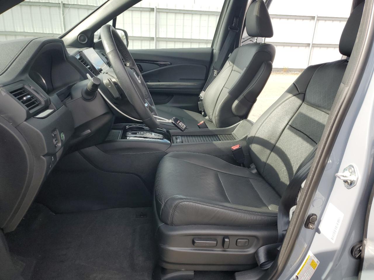 2023 Honda Passport Elite VIN: 5FNYF8H09PB017119 Lot: 92467955