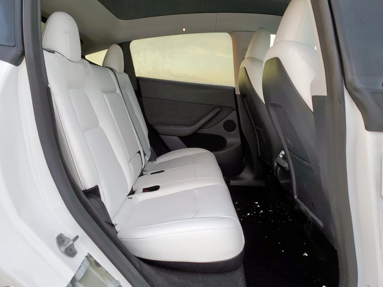 2023 Tesla Model Y VIN: 7SAYGDEE1PA107810 Lot: 89910945