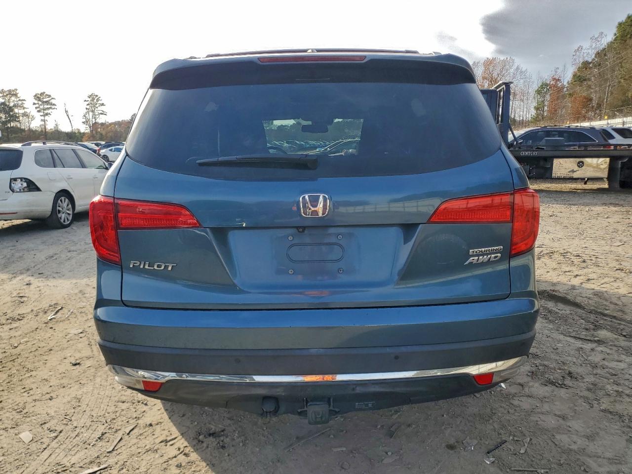 2016 Honda Pilot Touring VIN: 5FNYF6H9XGB082984 Lot: 94058495