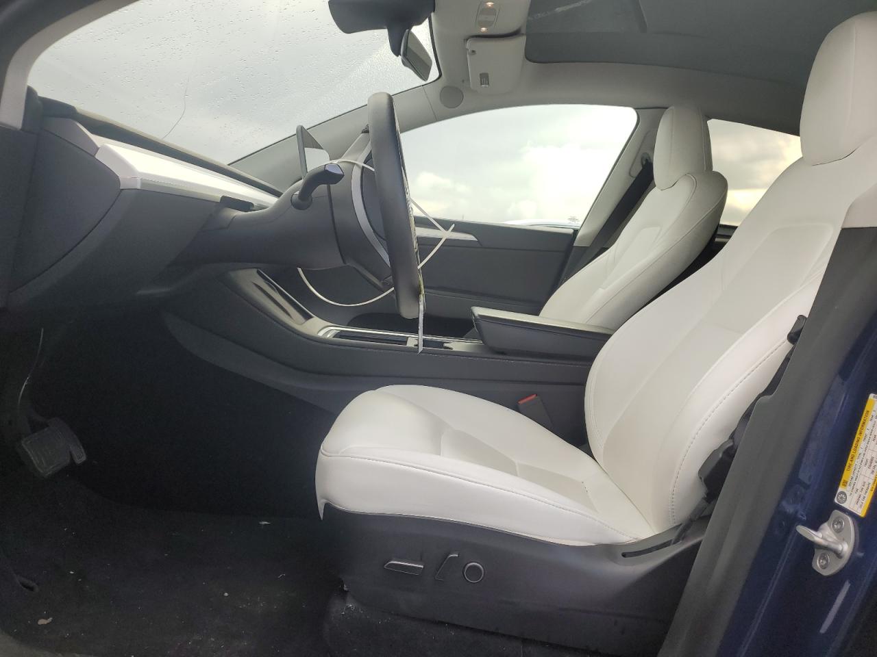 2023 Tesla Model Y VIN: 7SAYGAEE0PF697080 Lot: 92863945