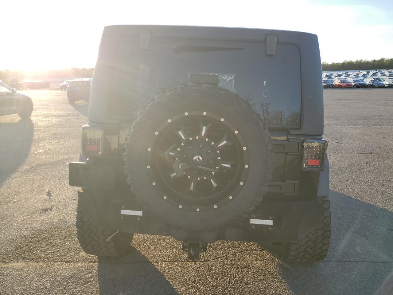 2012 Jeep Wrangler Unlimited Sport VIN: 1C4HJWDG6CL200040 Lot: 90898385