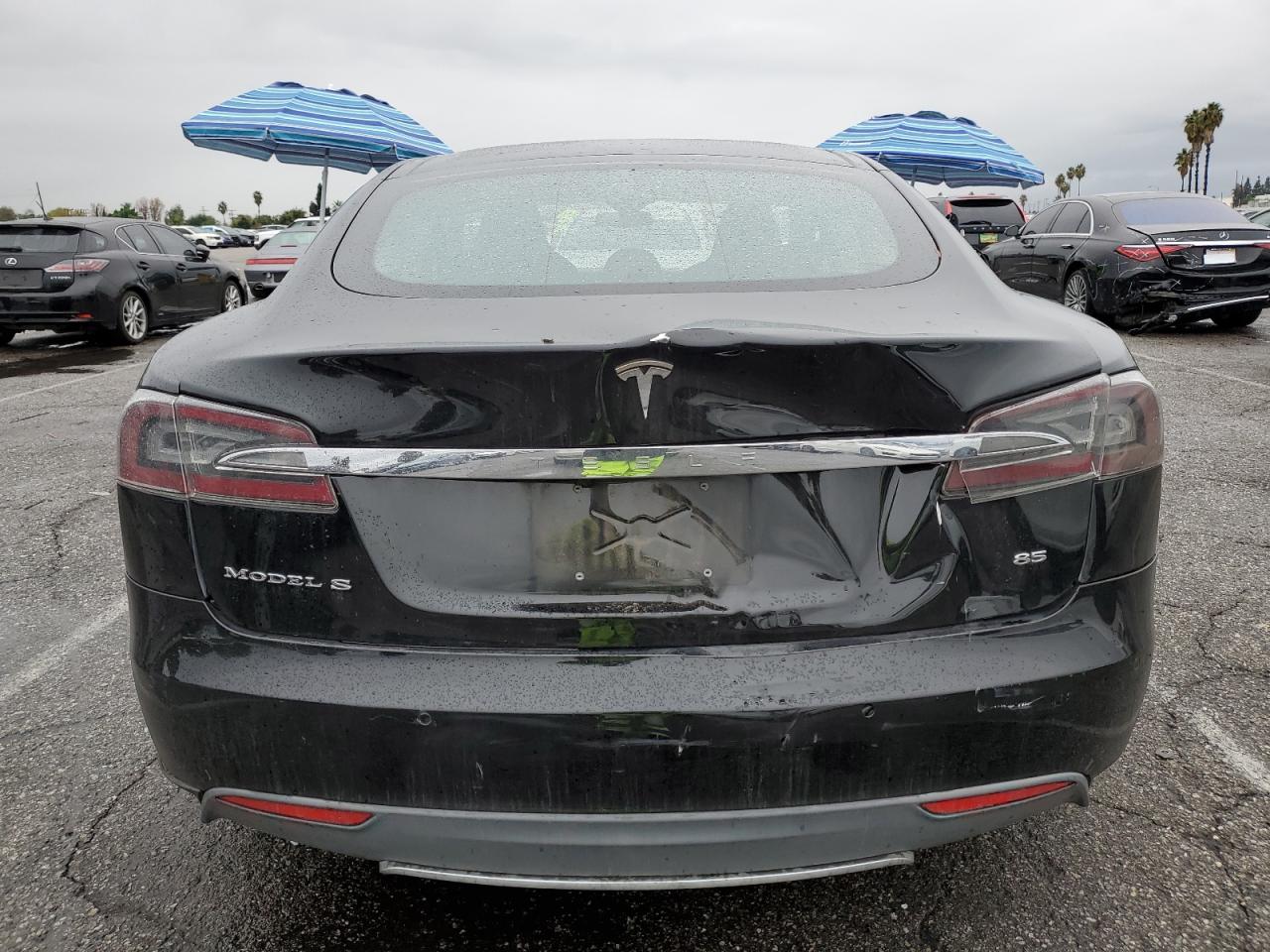 2014 Tesla Model S VIN: 5YJSA1H17EFP51887 Lot: 90459525