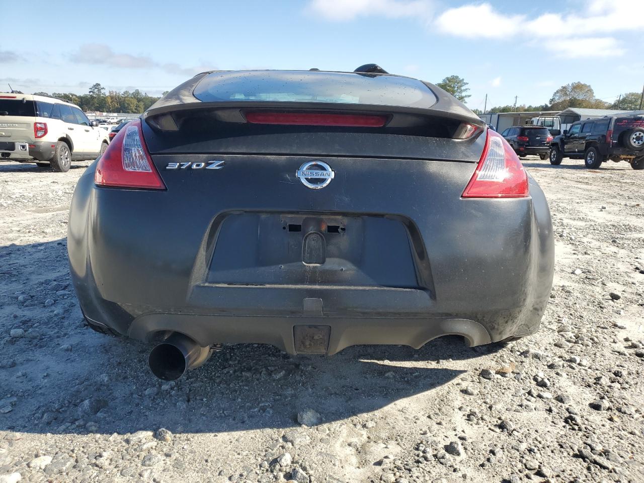 2009 Nissan 370Z VIN: JN1AZ44EX9M404083 Lot: 91008375