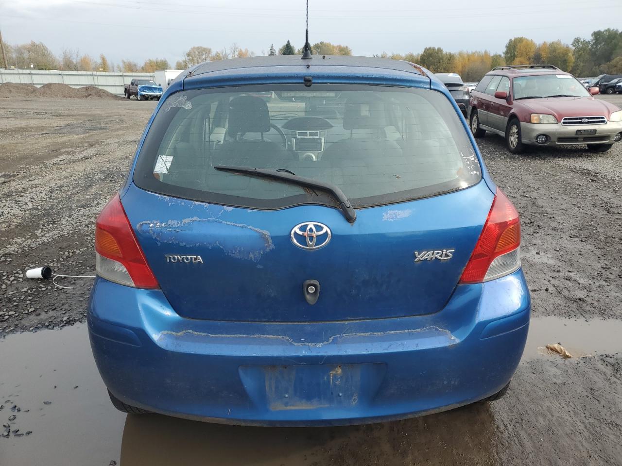 2009 Toyota Yaris VIN: JTDKT903495254776 Lot: 93248365