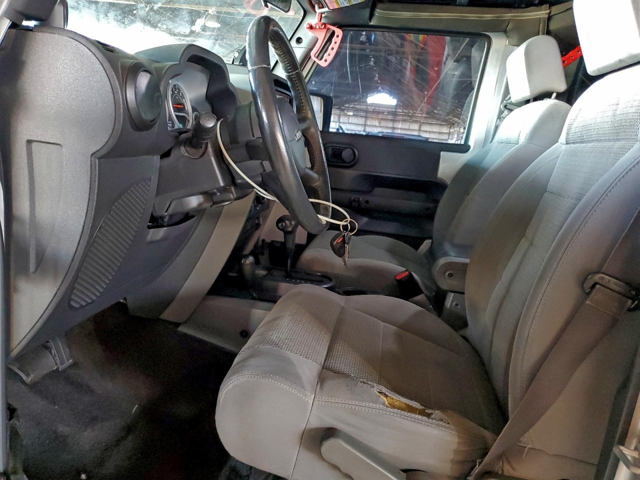 2007 Jeep Wrangler Sahara VIN: 1J8GA59127L140976 Lot: 94215415