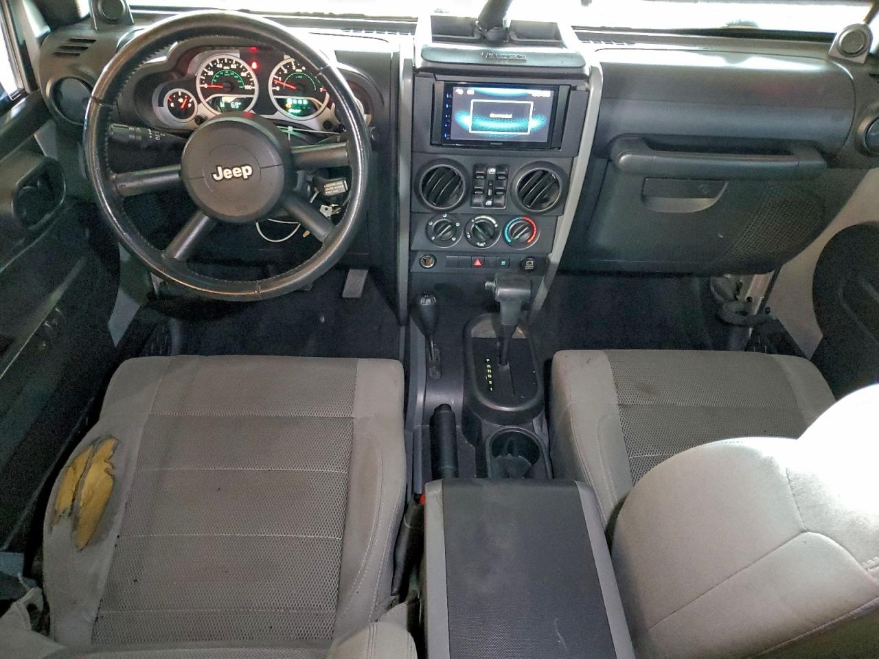 2007 Jeep Wrangler Sahara VIN: 1J8GA59127L140976 Lot: 94215415