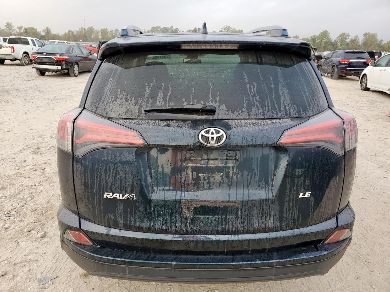 2018 Toyota Rav4 Le VIN: JTMZFREV2JJ211131 Lot: 93195585