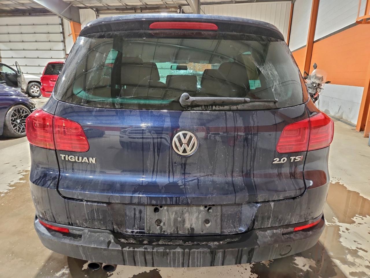2014 Volkswagen Tiguan S VIN: WVGHV3AX2EW611021 Lot: 94286455