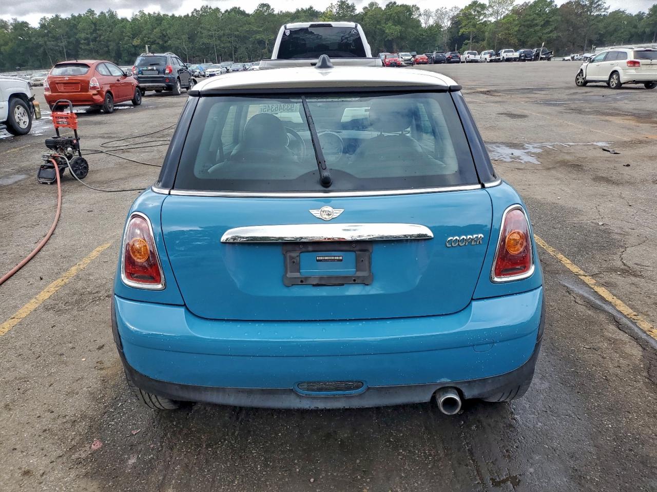 2009 Mini Cooper VIN: WMWMF33599TW73306 Lot: 93346345