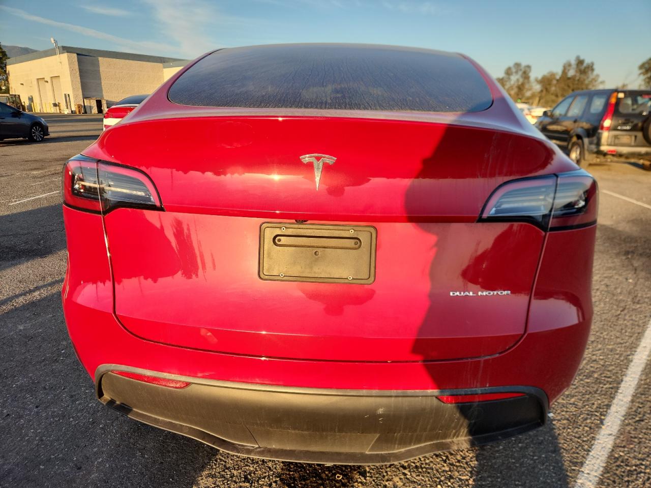2023 Tesla Model Y VIN: 7SAYGDEE4PF597596 Lot: 90700595