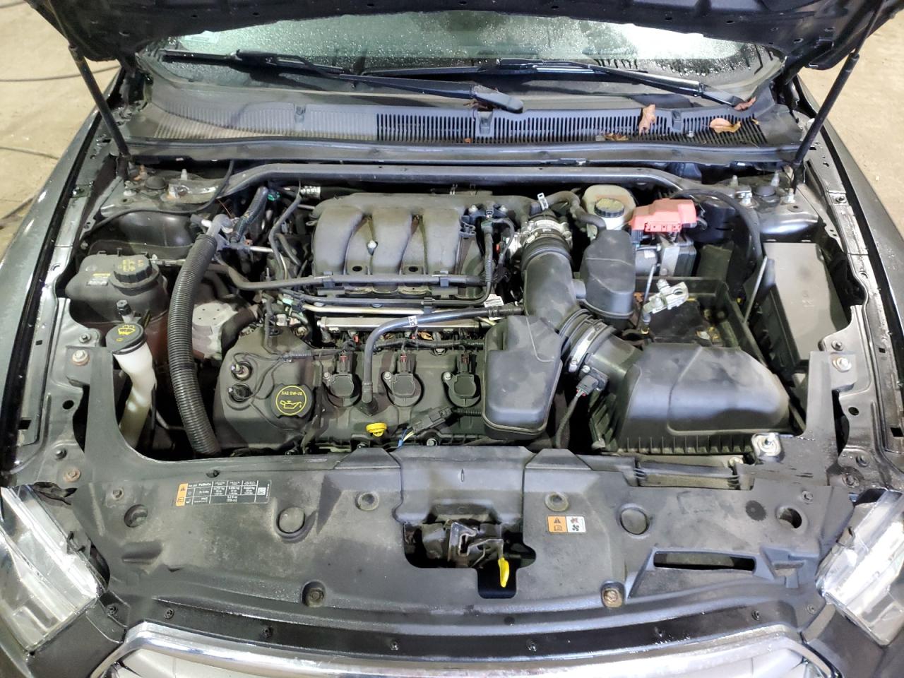 2015 Ford Taurus Sel VIN: 1FAHP2H89FG173980 Lot: 91716905