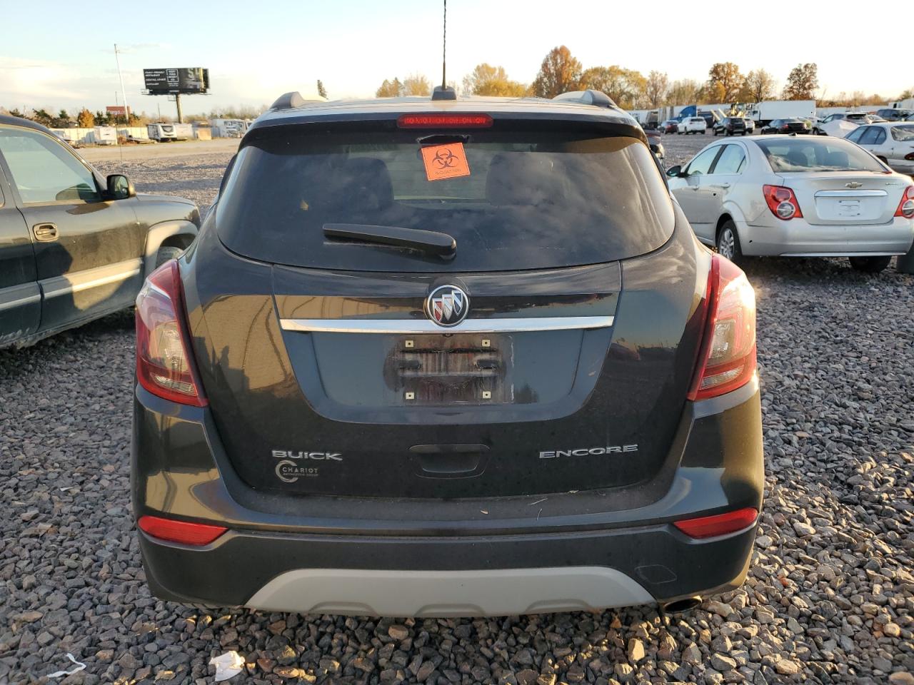 2018 Buick Encore Essence VIN: KL4CJCSB1JB640115 Lot: 90126865