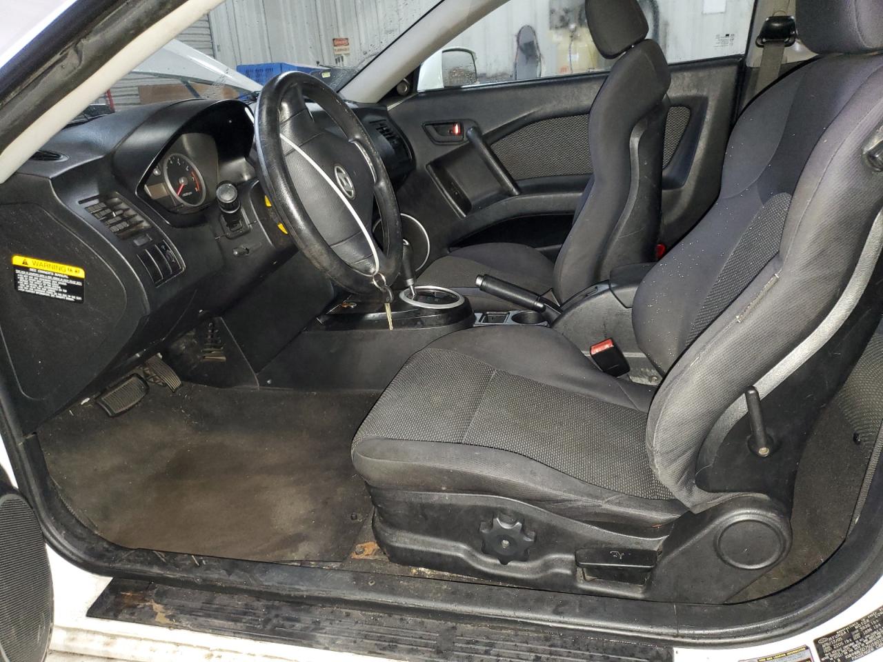 2005 Hyundai Tiburon VIN: KMHHM65D75U180109 Lot: 93043595