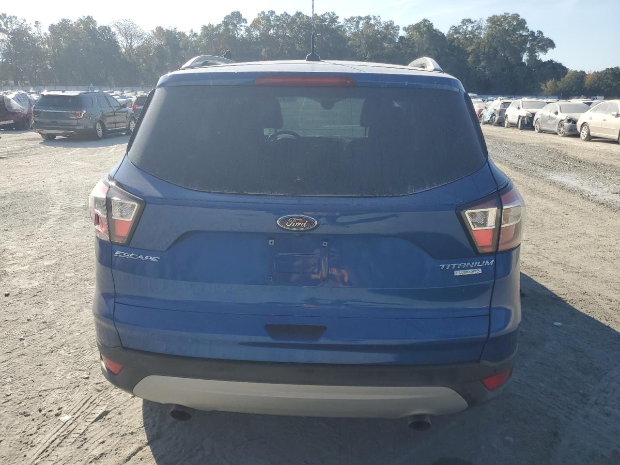 2017 Ford Escape Titanium VIN: 1FMCU0J9XHUE86797 Lot: 93416405